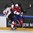 PARIS, FRANCE - MAY 7: Switzerland's Dean Kukan #34 checks Norway's Andreas Martinsen #24 during preliminary round action at the 2017 IIHF Ice Hockey World Championship. (Photo by Matt Zambonin/HHOF-IIHF Images)